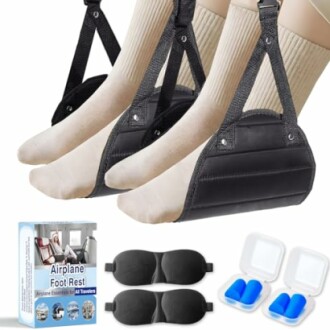 Airplane foot rest with accessories including eye masks and earplugs.