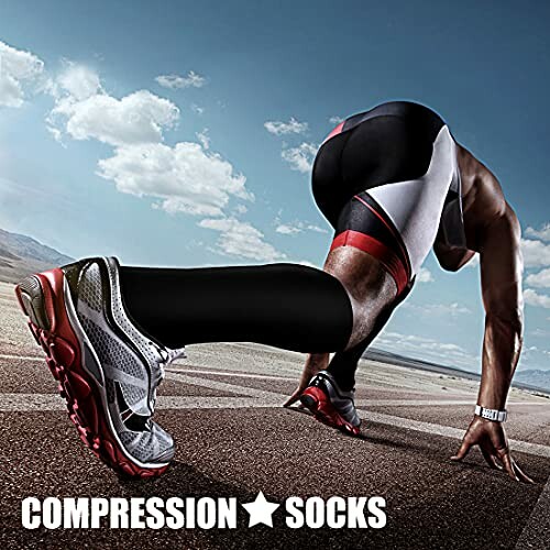 Athlete in starting position wearing compression socks