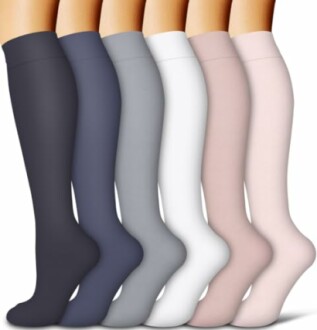 Six pairs of colorful knee-high socks in various shades.