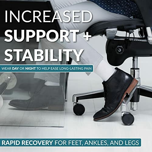 Person sitting in office chair wearing a supportive boot for increased stability.