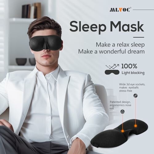 Man wearing a sleep mask sitting in a chair, showcasing a 100% light blocking sleep mask with ergonomic design.